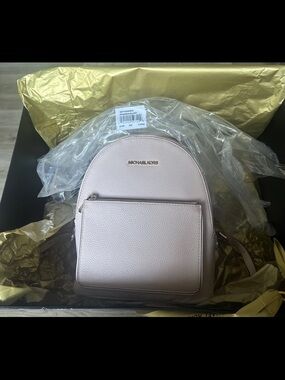 Michael Kors Pale Pink Pebbled Leather Mini Backpack